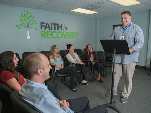 a group therapy in faith in recovery